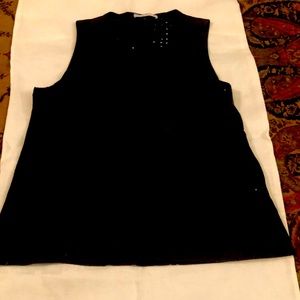 Sleeveless black top.